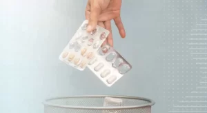 medicamento a la basura